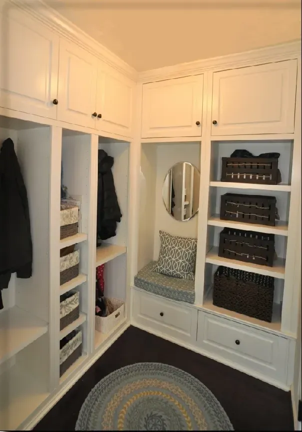 A closet with lots of shelves and baskets