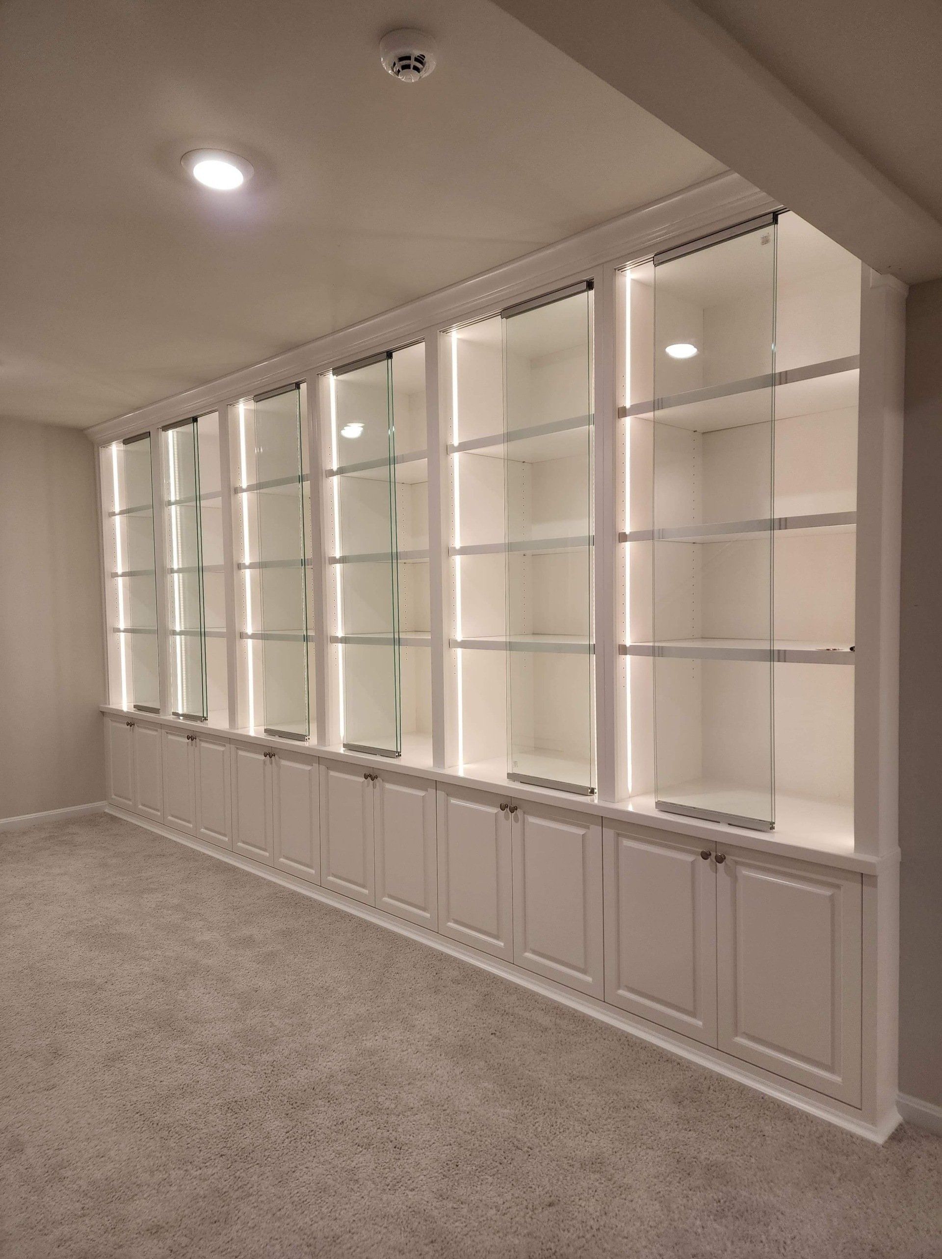 A room with a lot of shelves and cabinets