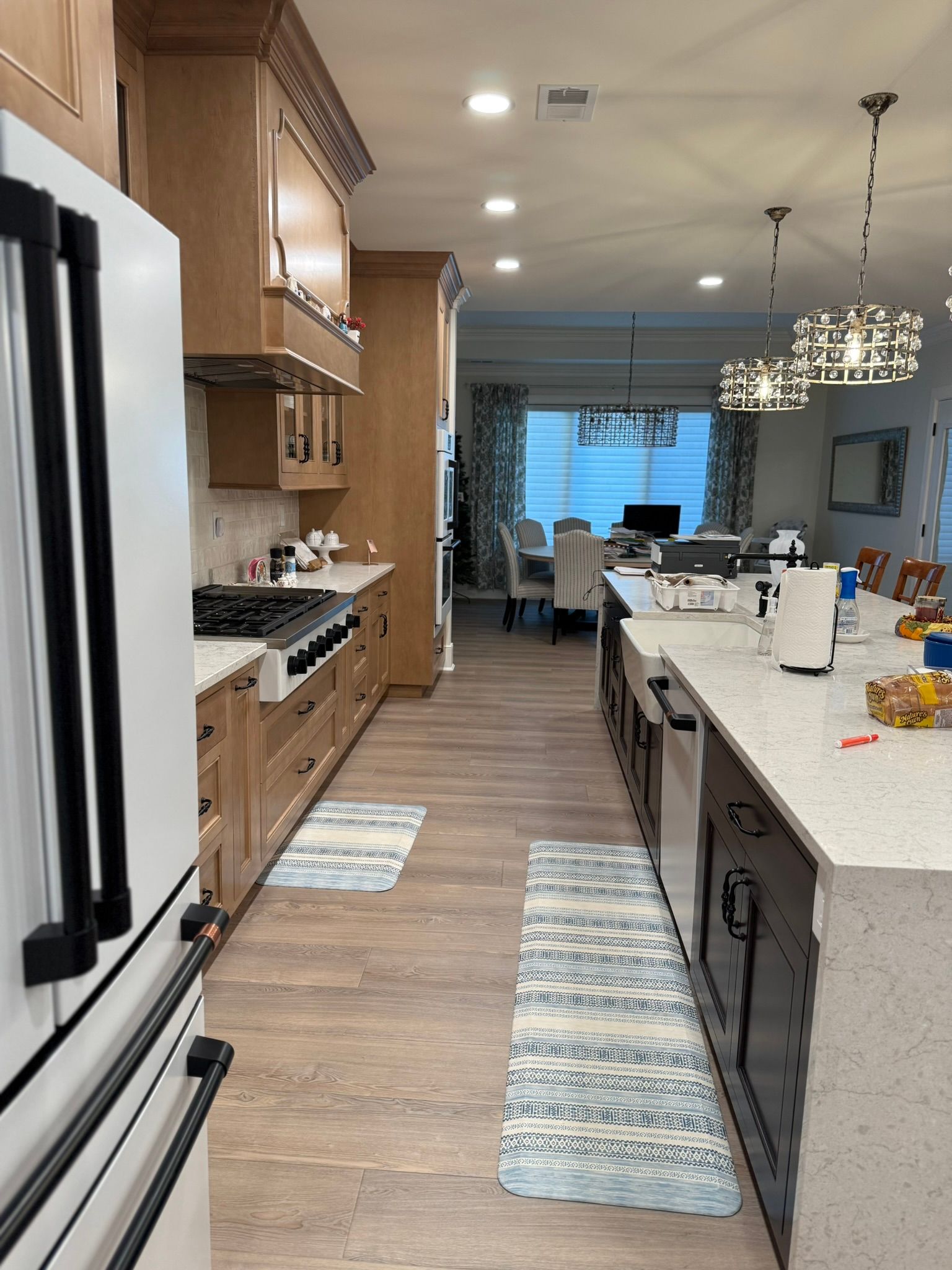 A kitchen with stainless steel appliances and granite counter tops