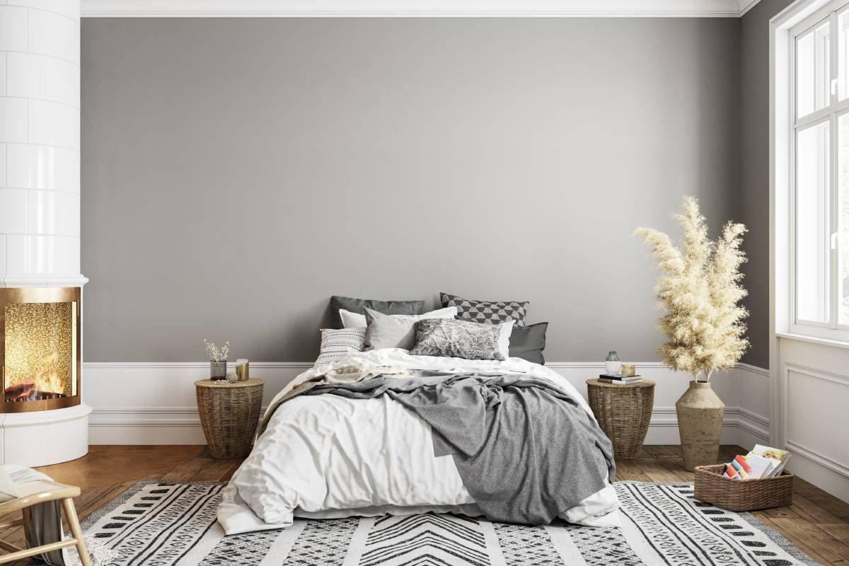 A bedroom with a fireplace and a window near Lakewood Ranch, Florida (FL)