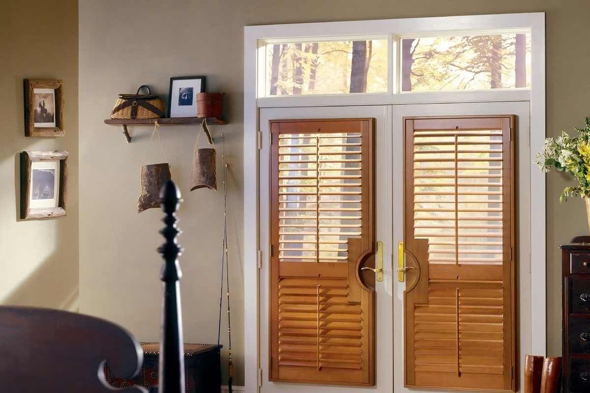 Hunter Douglas Heritance® Wood Shutters installed on a home’s french doors near Lakewood Ranch, Florida (FL)