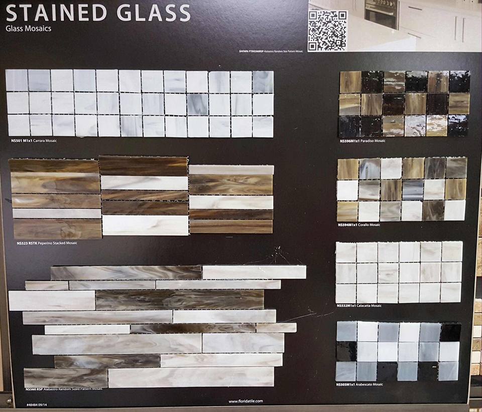 A display of different types of stained glass tiles