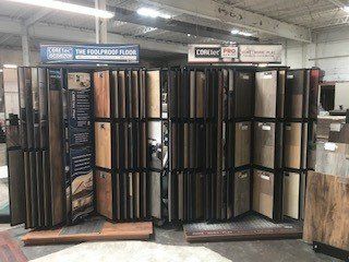 There are many different types of flooring on display in this store.