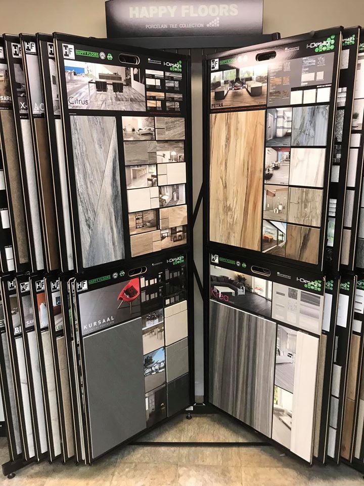 A display of tiles and carpets in a store.