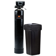 Black water softener tank with control head beside a brown lidded container on white background