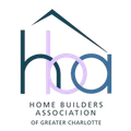The logo for the home builders association of greater charlotte.