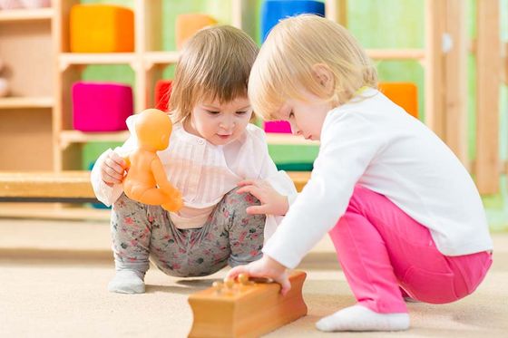 Children playing with building blocks