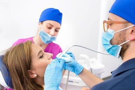 Woman Having Teeth Examined at Dentists - Root Canal in Liverpool, NY