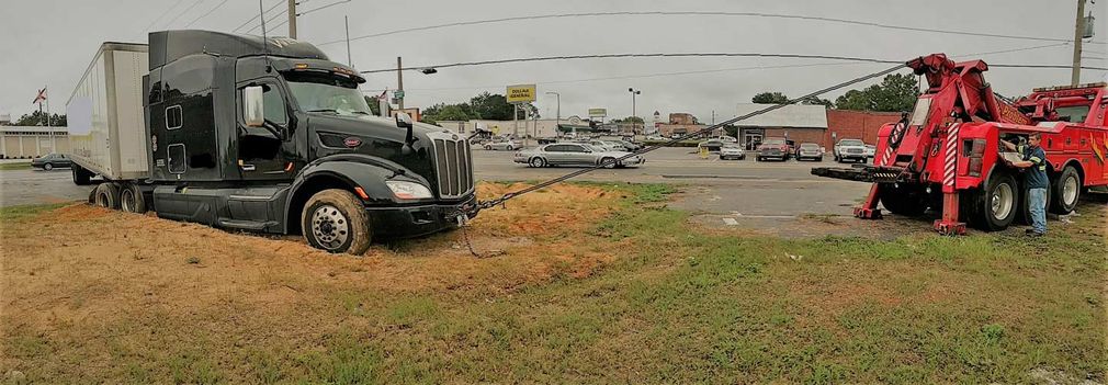 Towing black truck - towing in Tallahassee FL