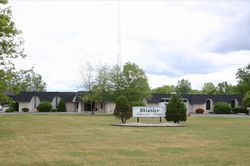 Exterior view of Mishler Funeral Home in Bremen, IN.