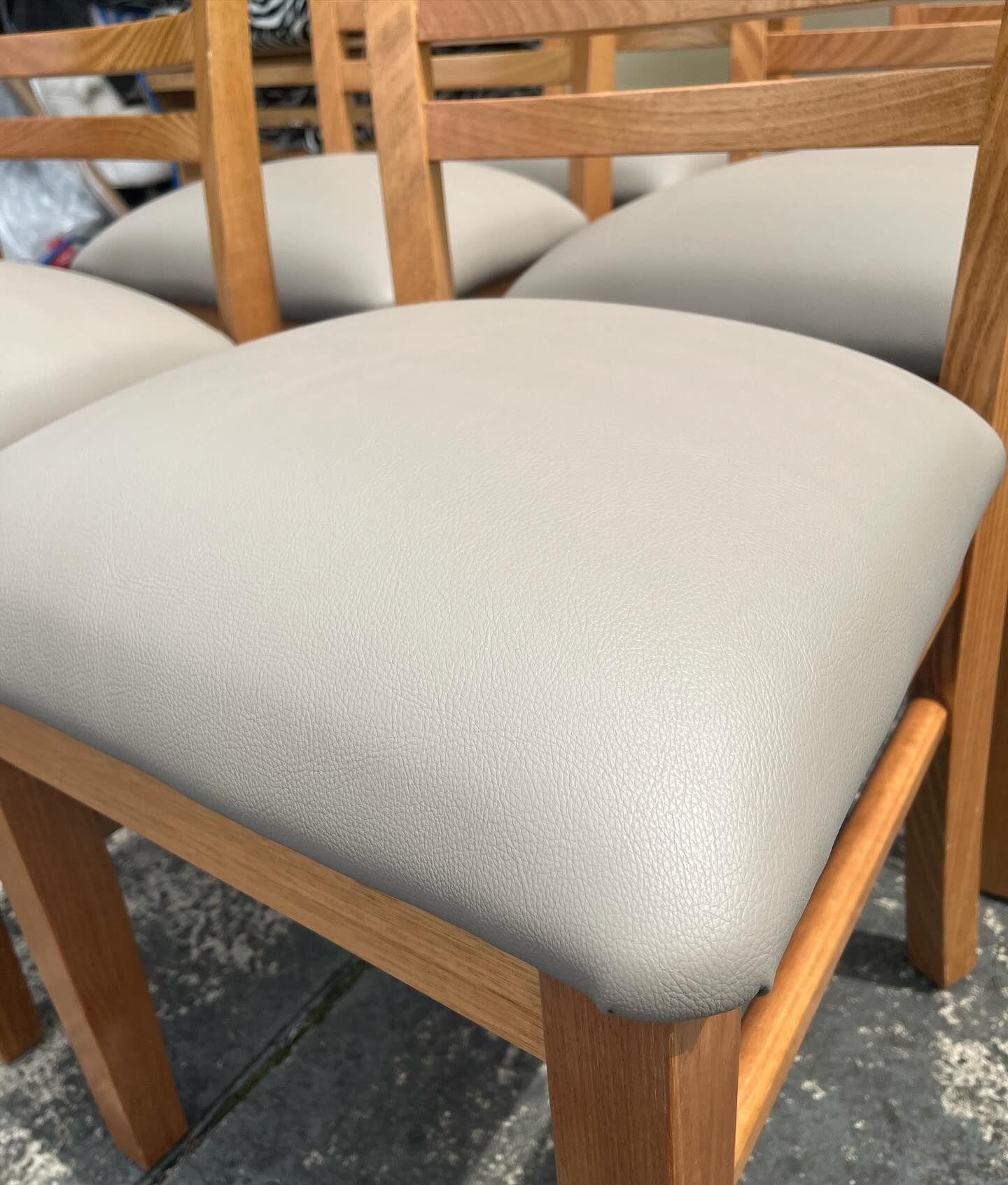 A close up of a chair with a white seat — Metreson Upholstery In Unanderra, NSW