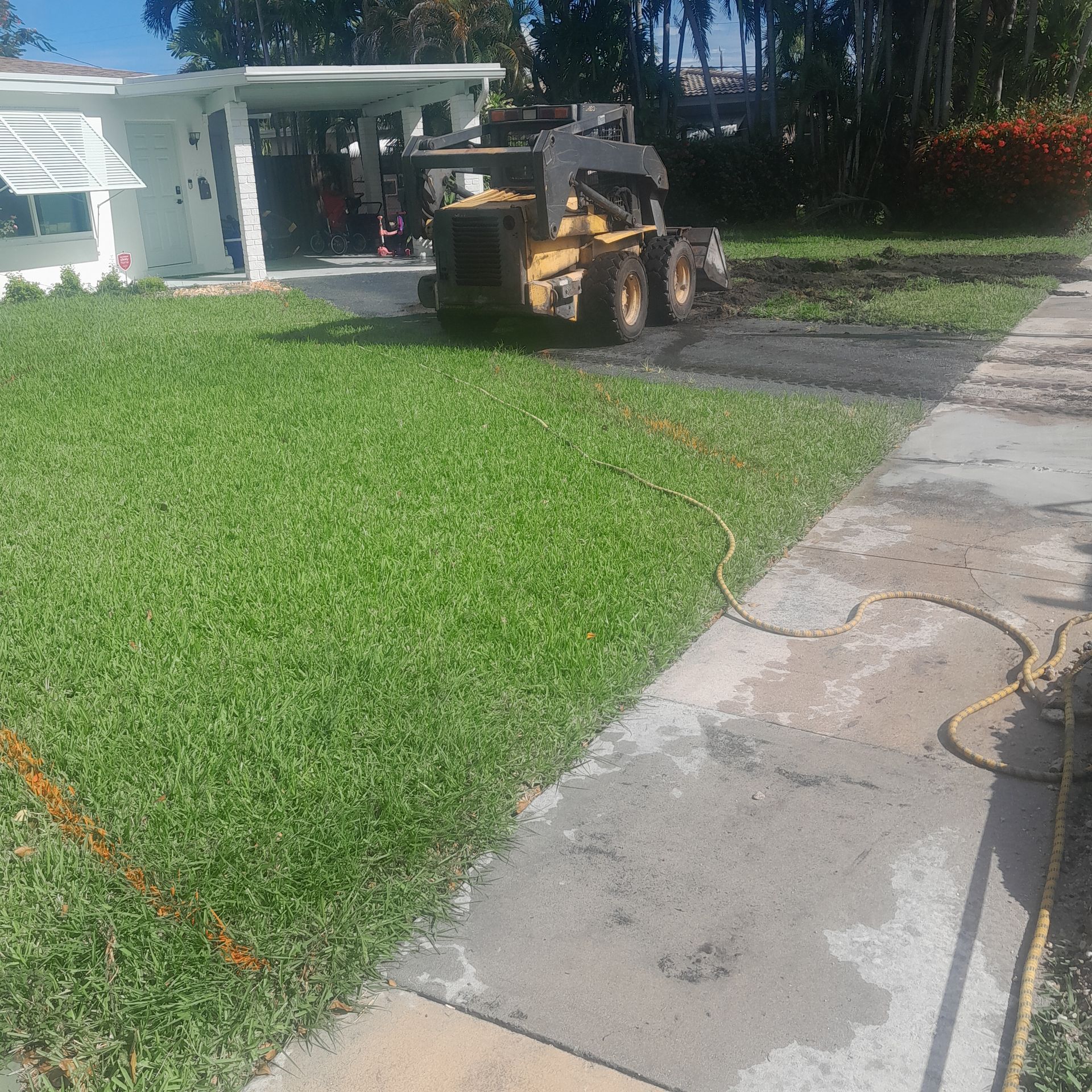 Concrete walkway in the foreground in Parkland FL