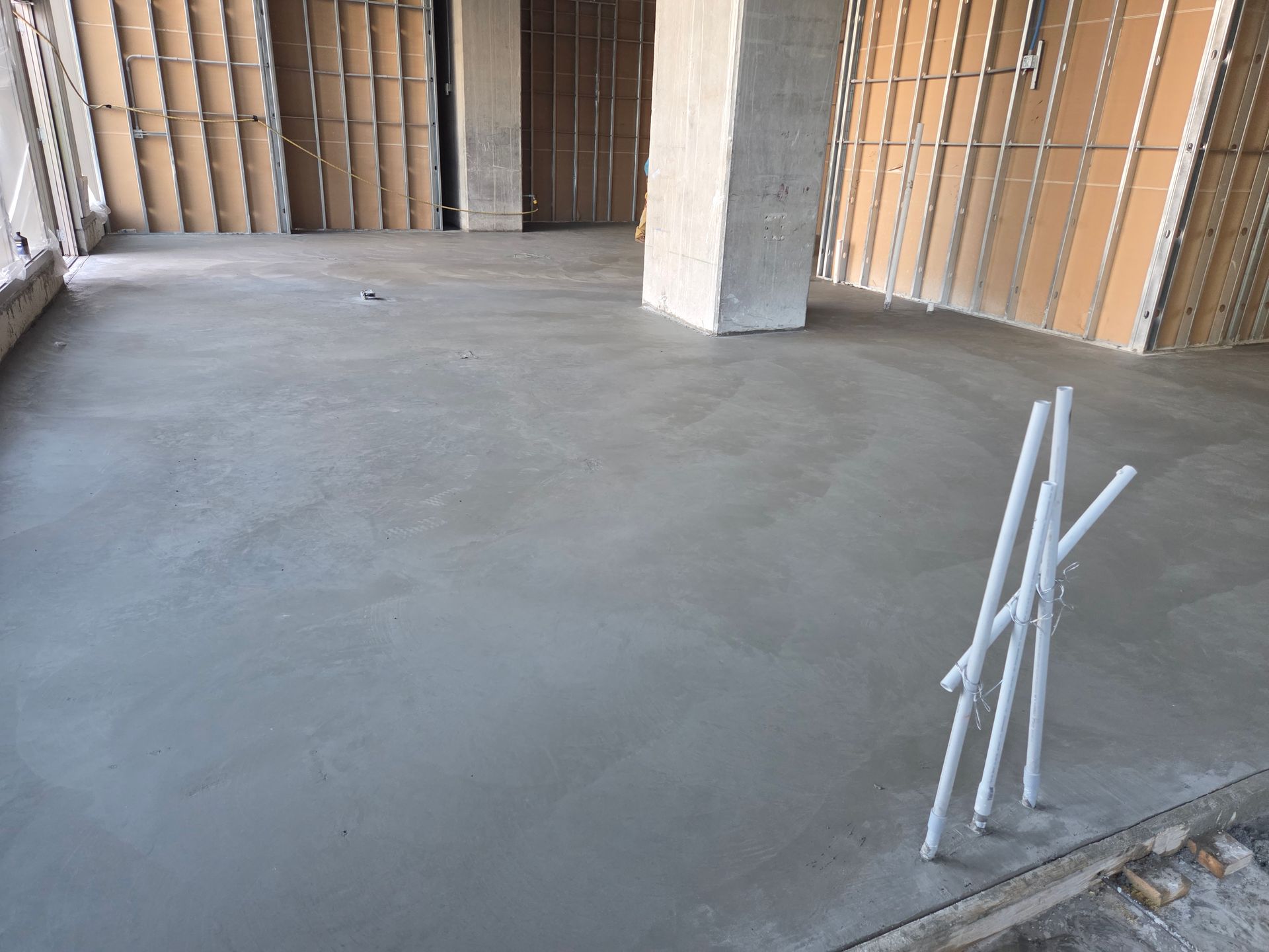 Newly poured concrete floor in a construction site in Parkland FL