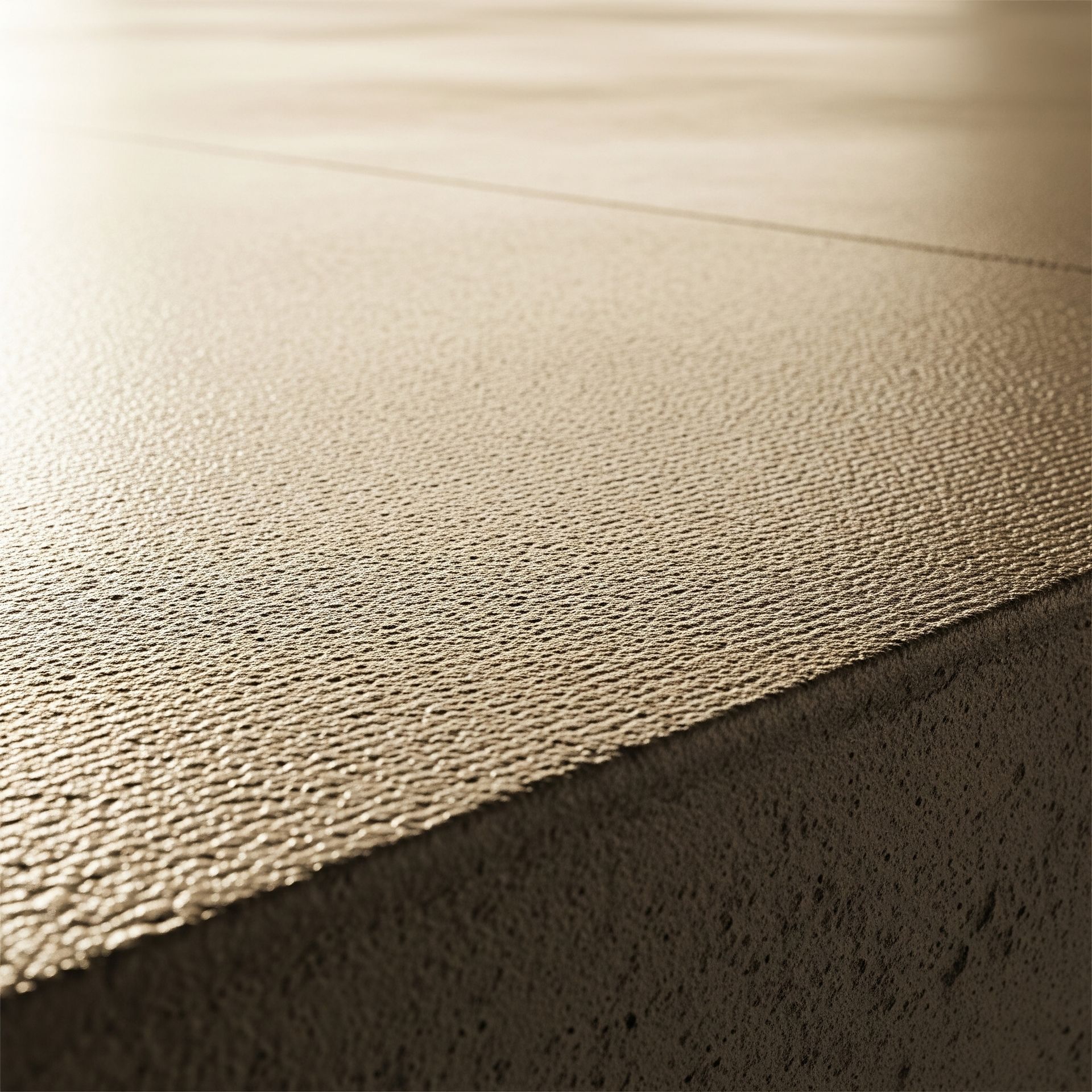 A close up of a concrete surface with a grainy texture