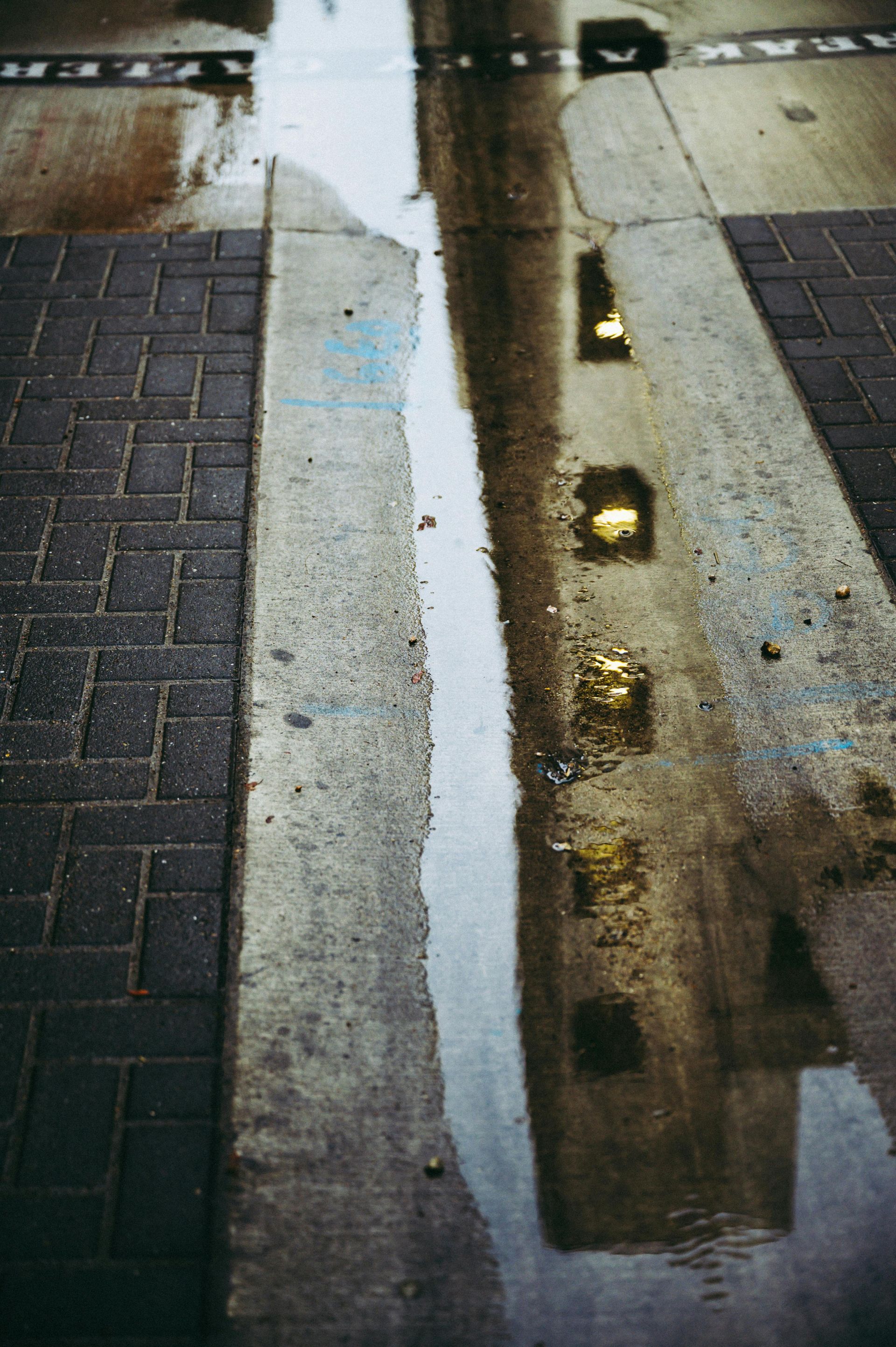 A wet garage concrete pavement