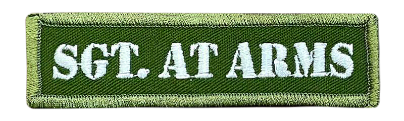A green patch with the words sgt at arms written on it.