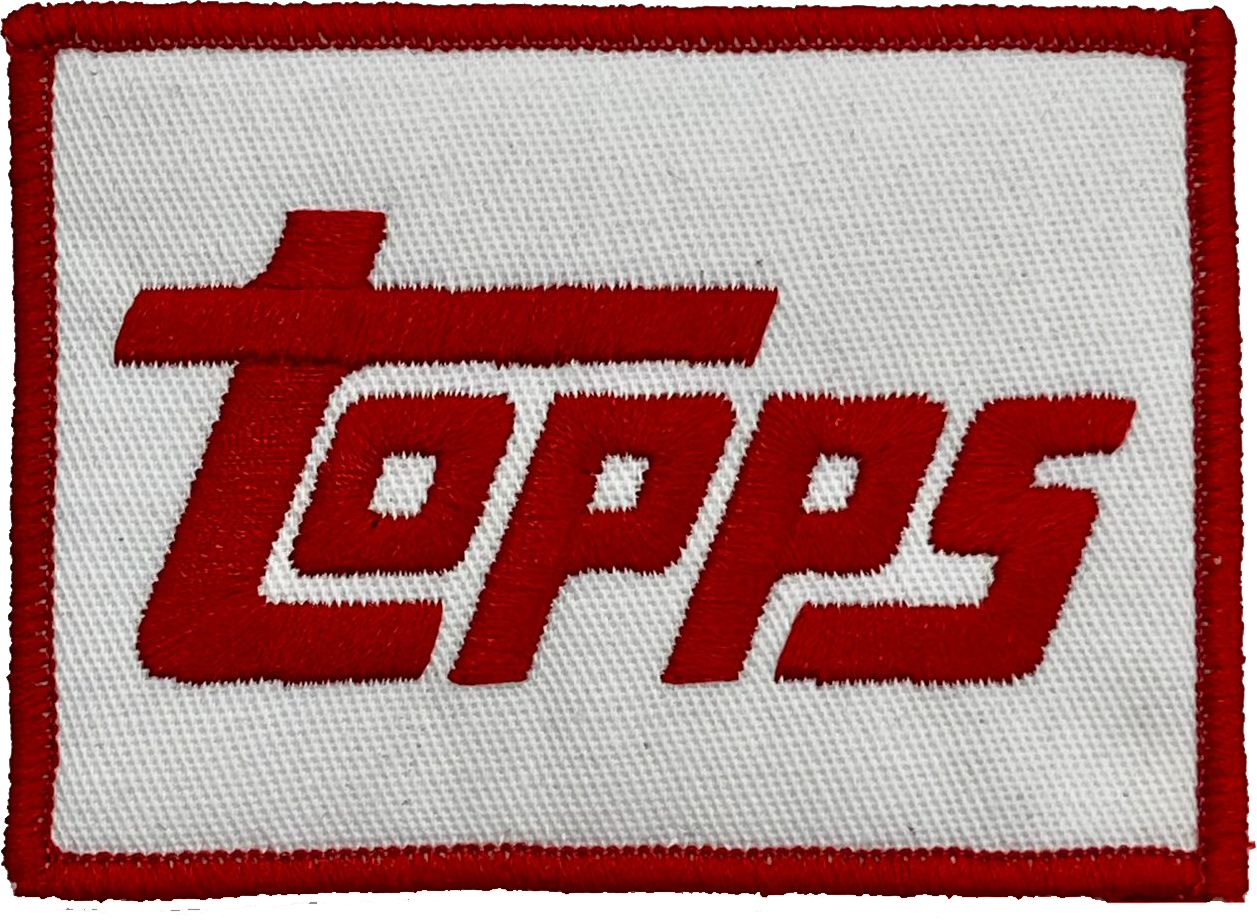 a red and white patch with the word topps on it