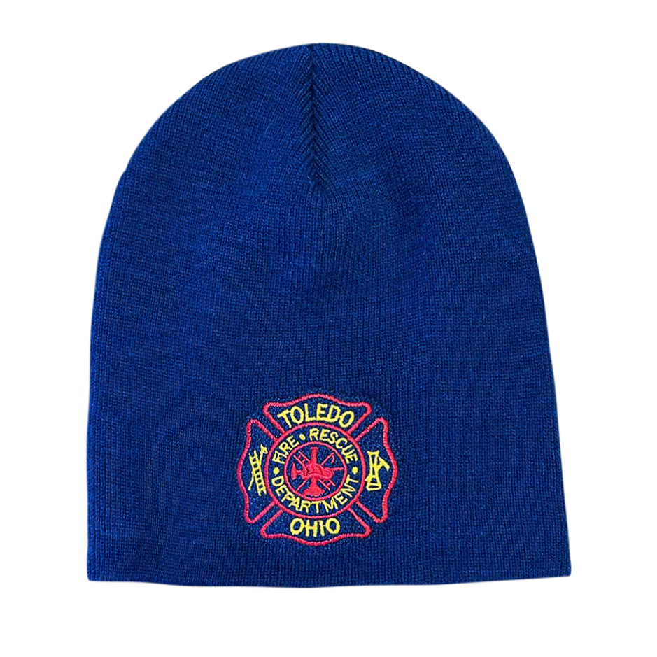 A blue beanie with a toledo fire department logo on it