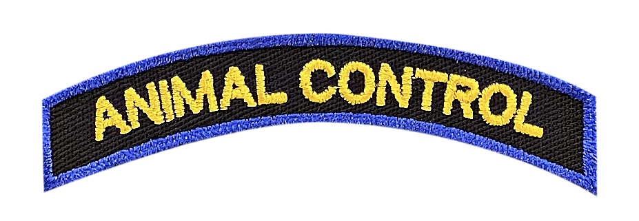 A blue and black animal control patch on a white background.