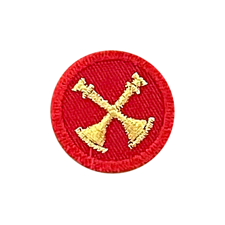 A red circle with two gold bells embroidered on it