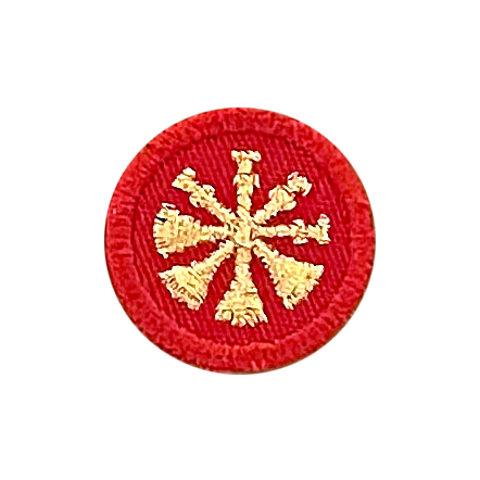 A red badge with a gold star on it