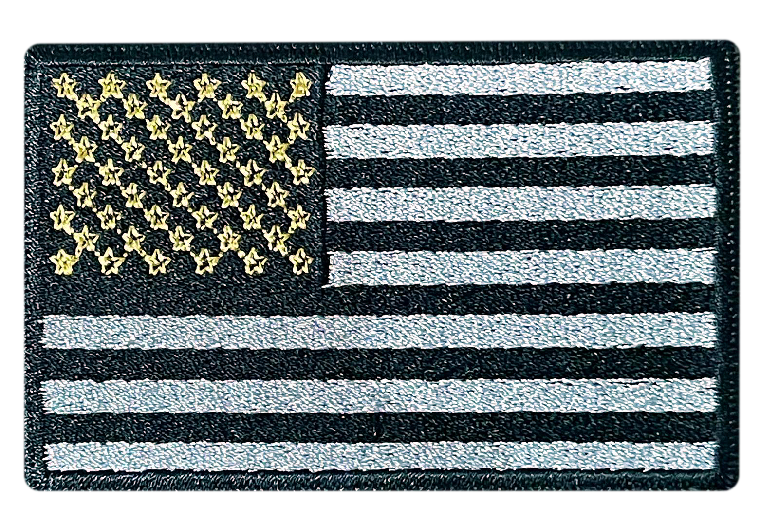 A black and silver american flag with gold stars on a white background.