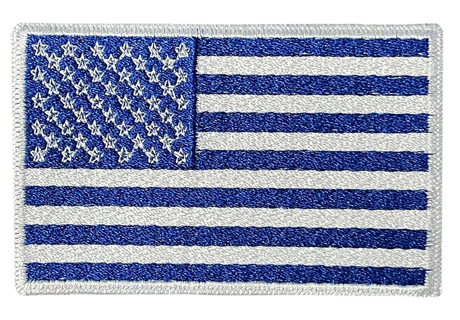 A blue and white american flag patch on a white background.