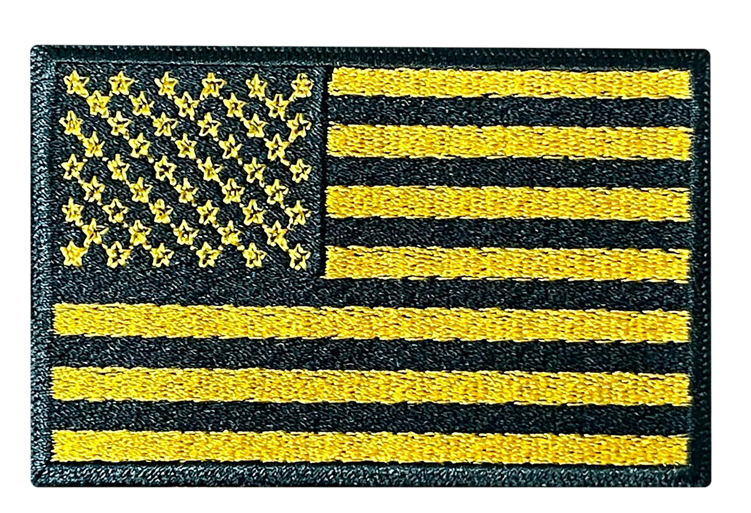 A black and yellow american flag patch on a white background.