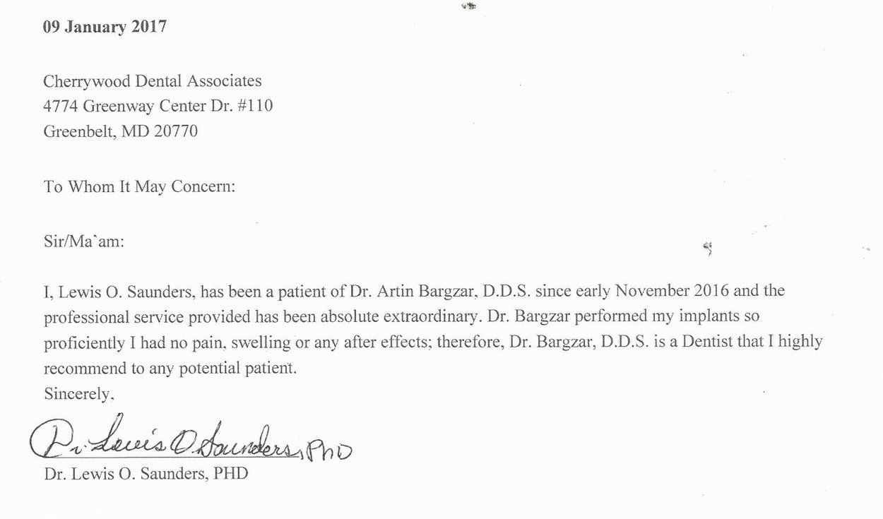 A black and white letter with a signature on it