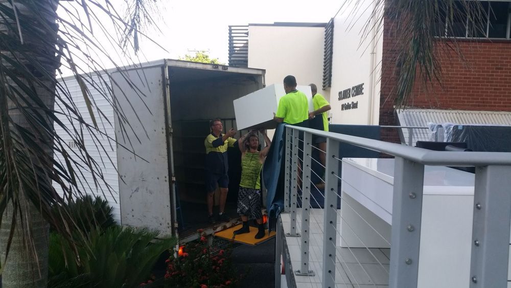 Removalists Loading Furnitures in Truck