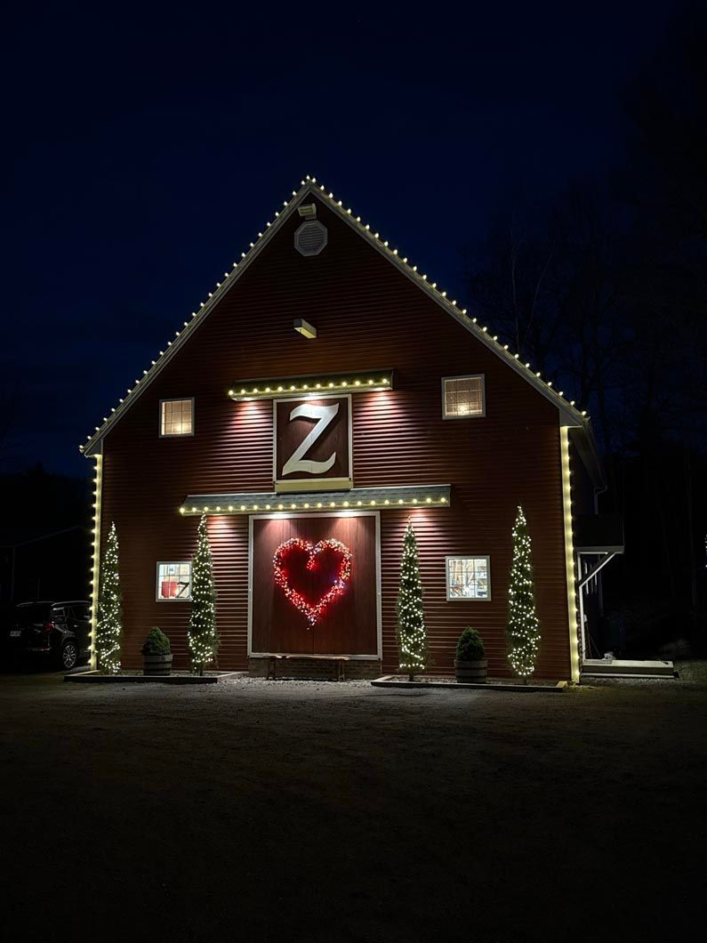 A barn with a heart and the letter z on it