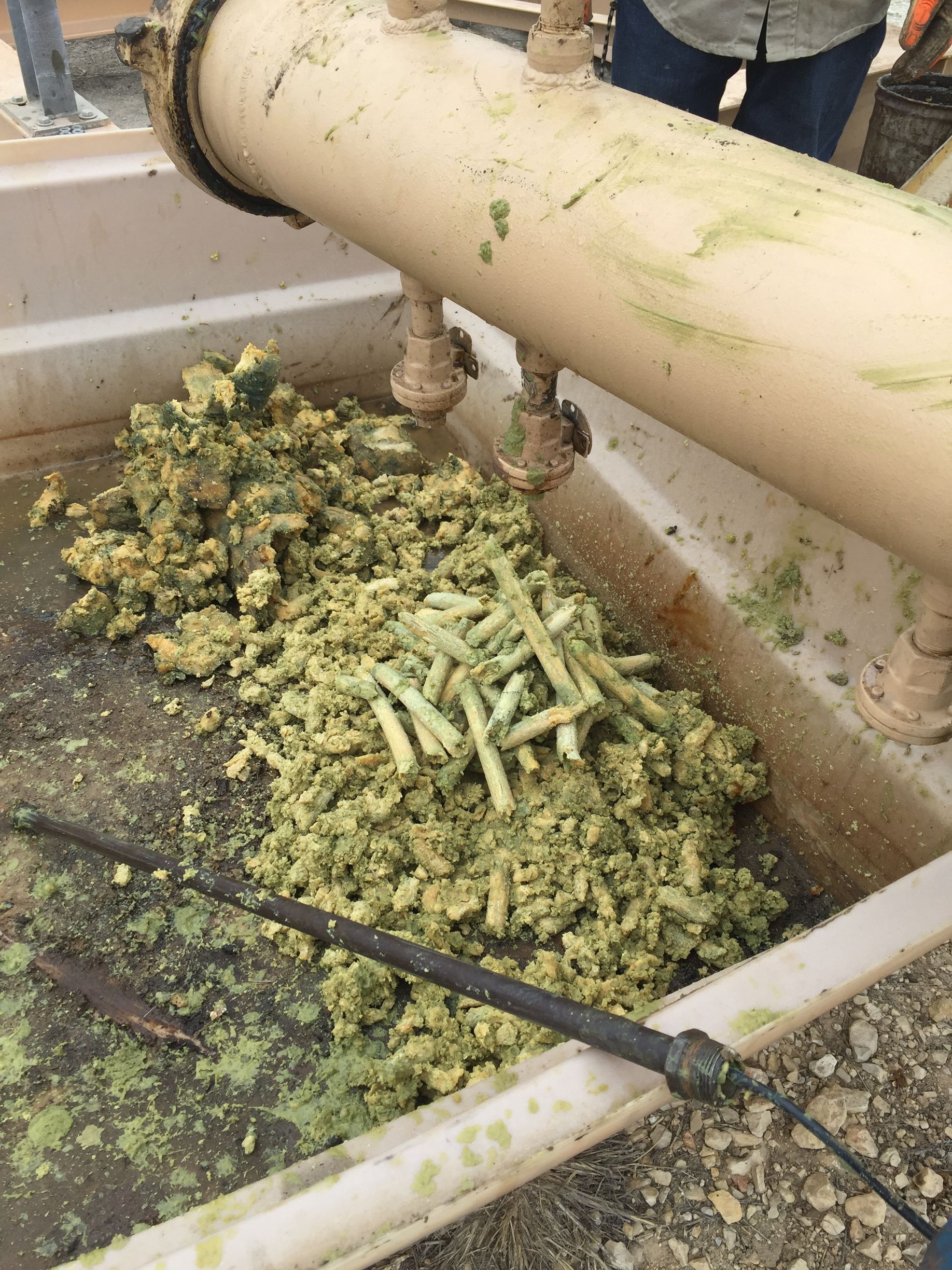 Heavy wax debris is being pushed out of a pipeline by an Enduro Cleaing Pig