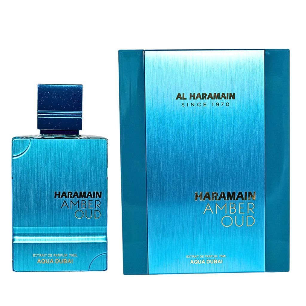 Frasco y caja de perfume Al Haramain Amber Oud, de color azul verdoso con letras doradas.