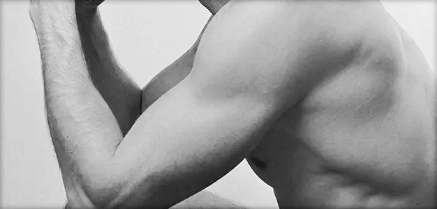 closeup of man's bare arm and chest