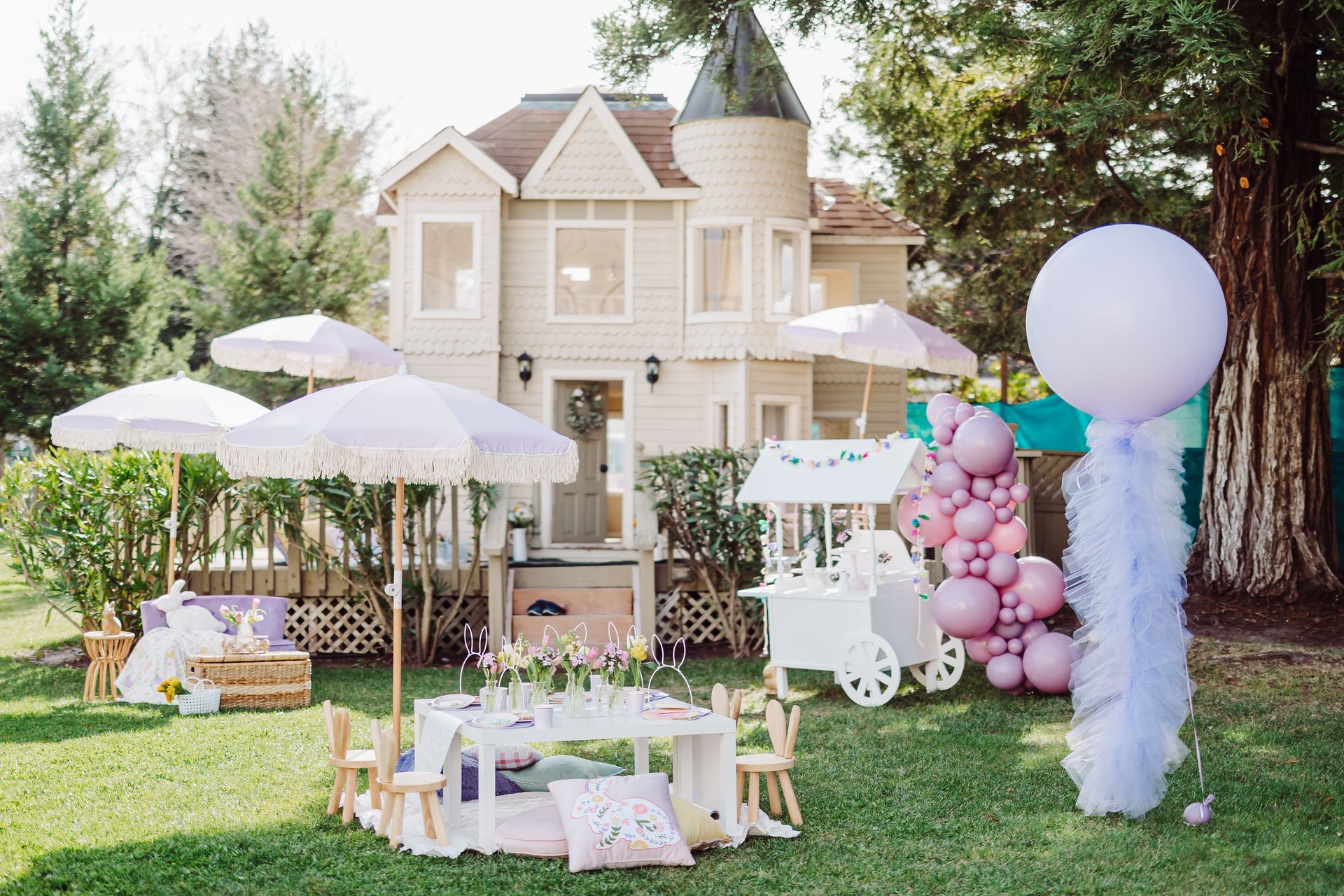 A bride and groom are holding sparklers at a wedding reception.