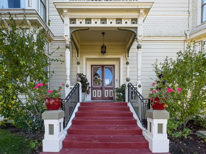 red-stairway-entry-to-front-door