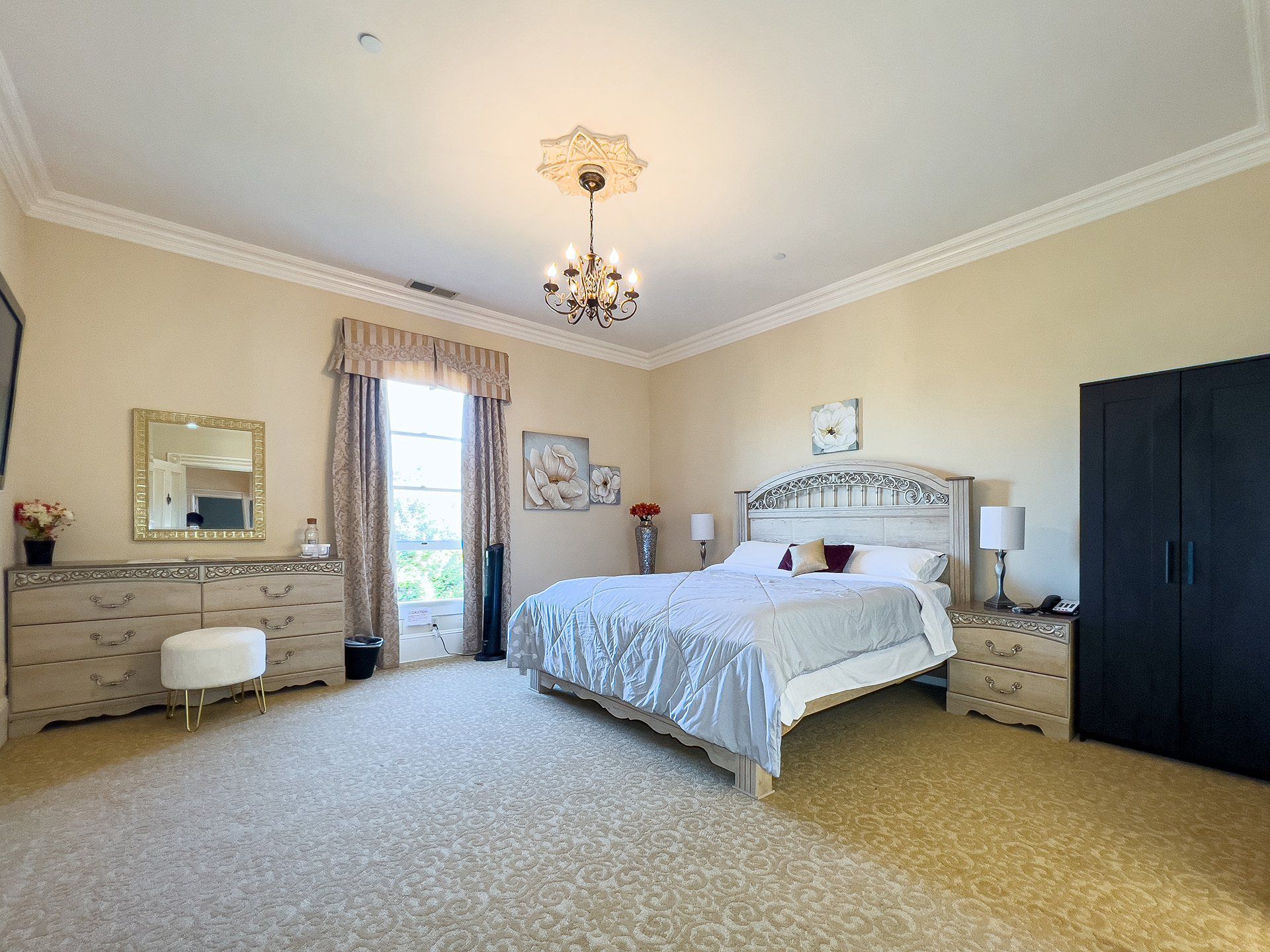 There is a large bed in the middle of the room.