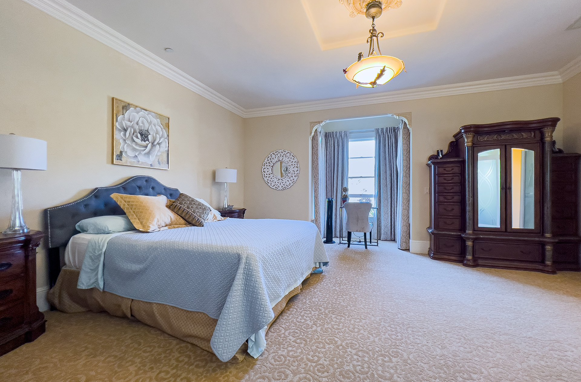 There is a large bed in the middle of the room.