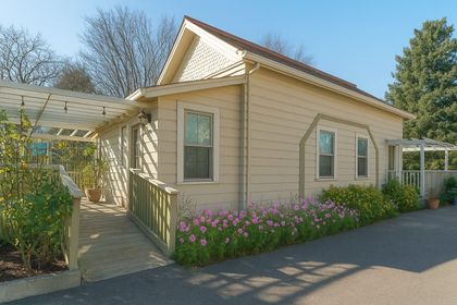 Private Cottage at Chateau Coralini with kitchen, cozy living area, and pergola patio in Salinas Valley