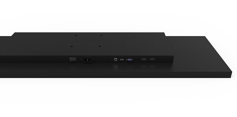 A black computer monitor is sitting on top of a white table.