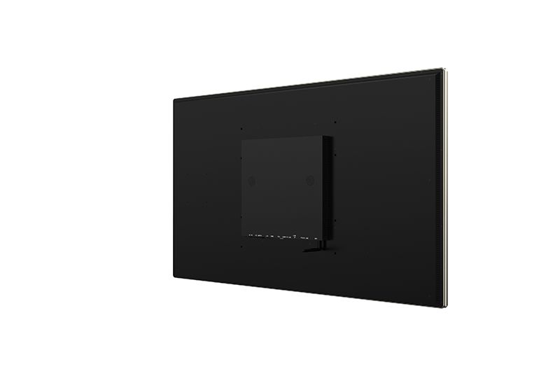 A black flat screen tv is mounted on a white wall.
