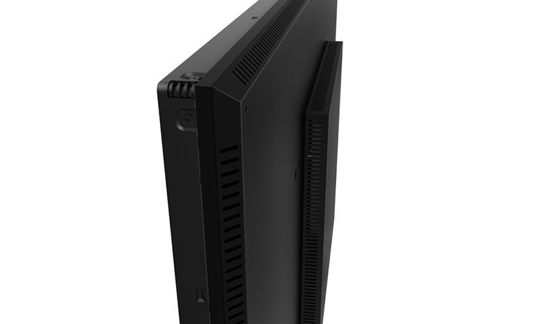 A black computer monitor is sitting on a white surface.