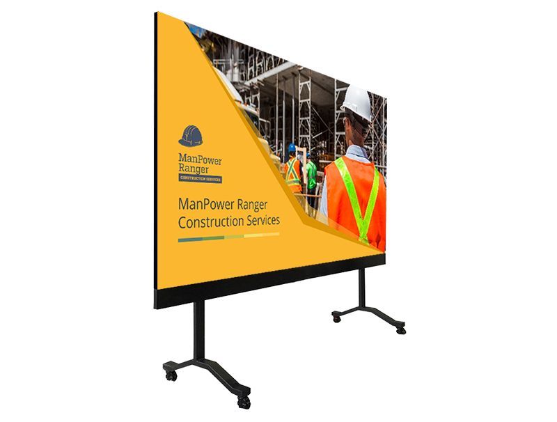 A large screen with a picture of a construction site on it.