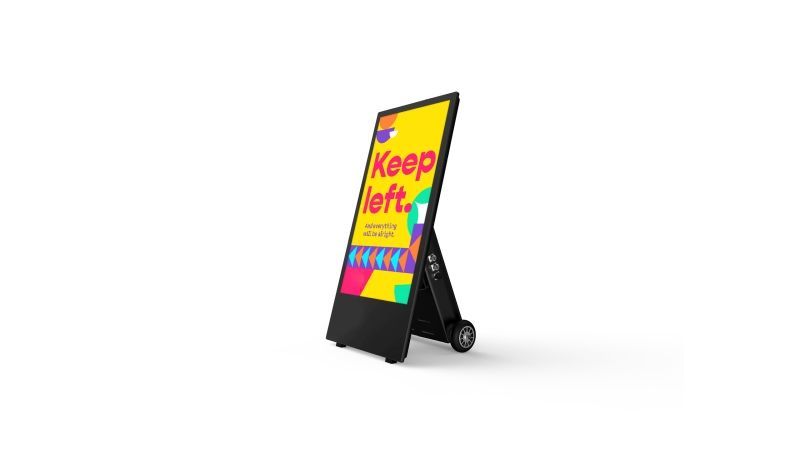 A tablet with a colorful screen and the words `` keep left '' on it.