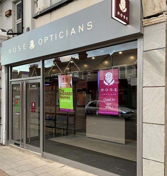 The outside of a store called rose opticians