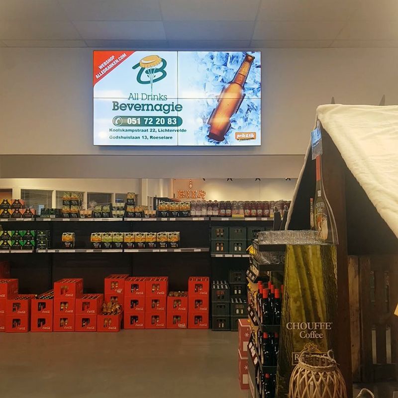 A store with a sign that says all drinks beverages