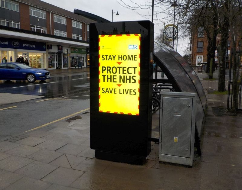 A sign that says stay home protect the nhs save lives
