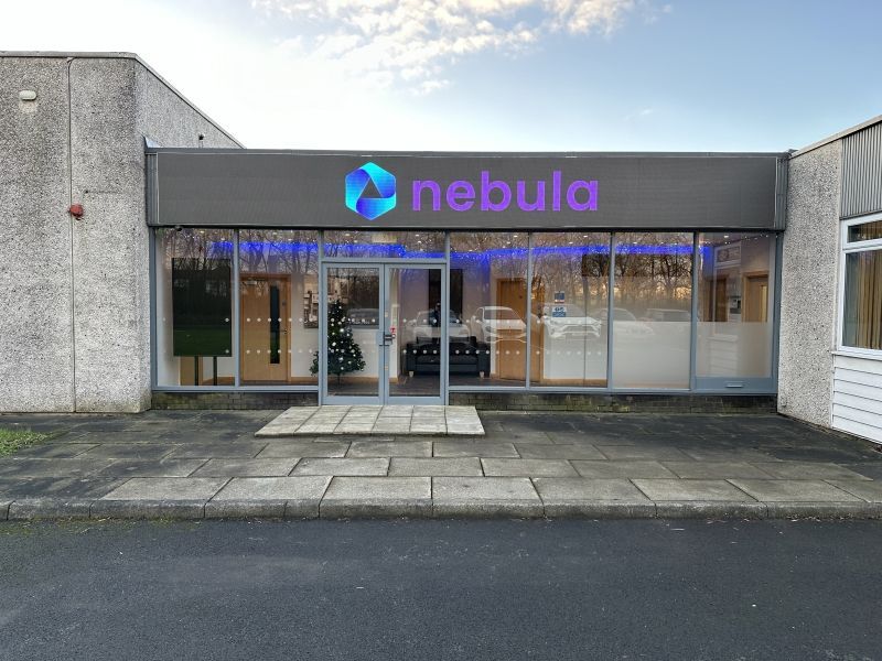 A building with a sign that says nebula on it