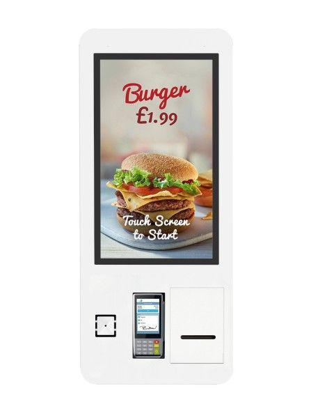 A touchscreen kiosk with a picture of a hamburger on it.