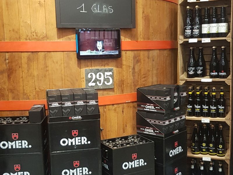Boxes of omer beer are stacked on top of each other